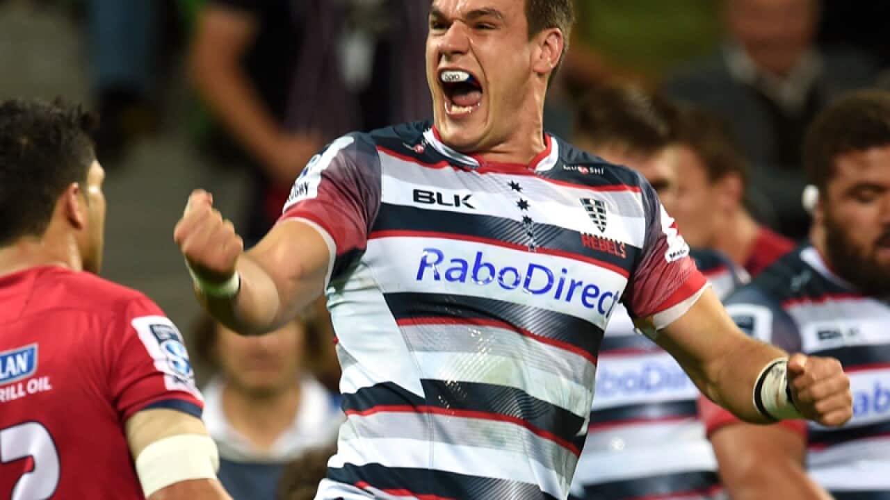 The Rebel's Mitch Inman celebrates after Melbourne scored a try
