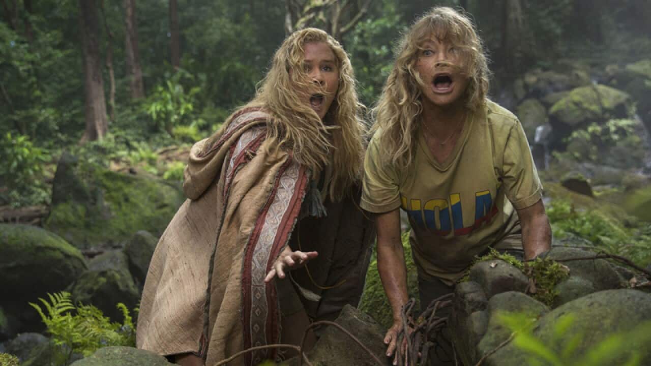 Goldie Hawn, right, and Amy Schumer in a scene from "Snatched"