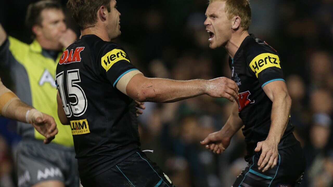 Panthers 's Peter Wallace (Right) celebrates with his team mates