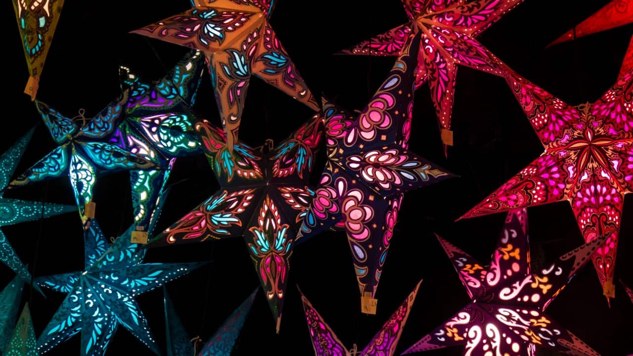 Colorful Christmas stars. A background of star lanterns.
