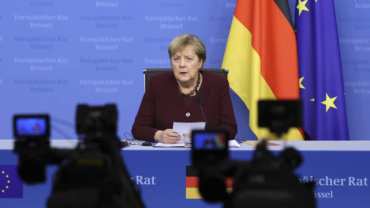 German Chancellor Angela Merkel speaks during a media conference at an EU summit in Brussels.