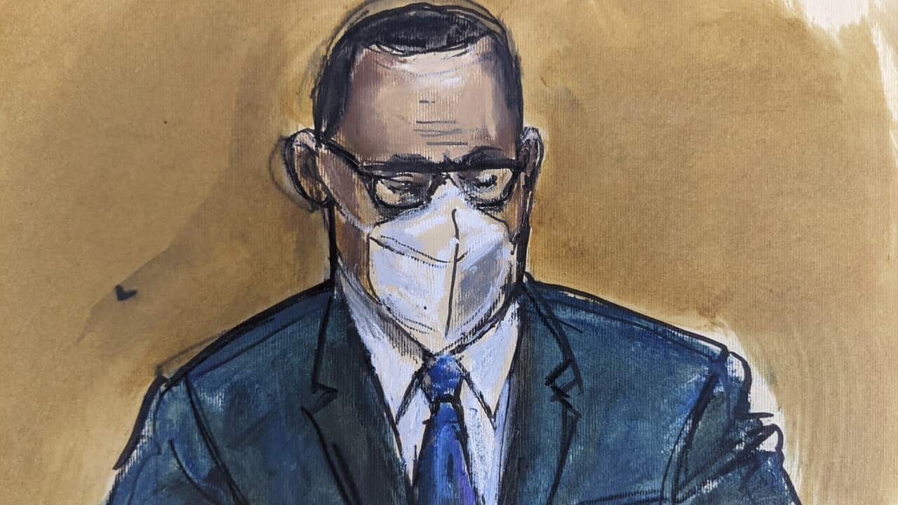 In this courtroom sketch, R. Kelly listens as the jury foreperson reads the verdict