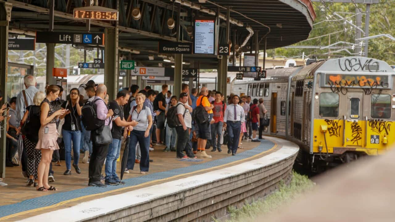 Commuters are seen at Central Station Sydney