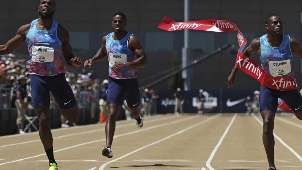 Ameer Webb wins the men's 200 meters as Christian Coleman (R)