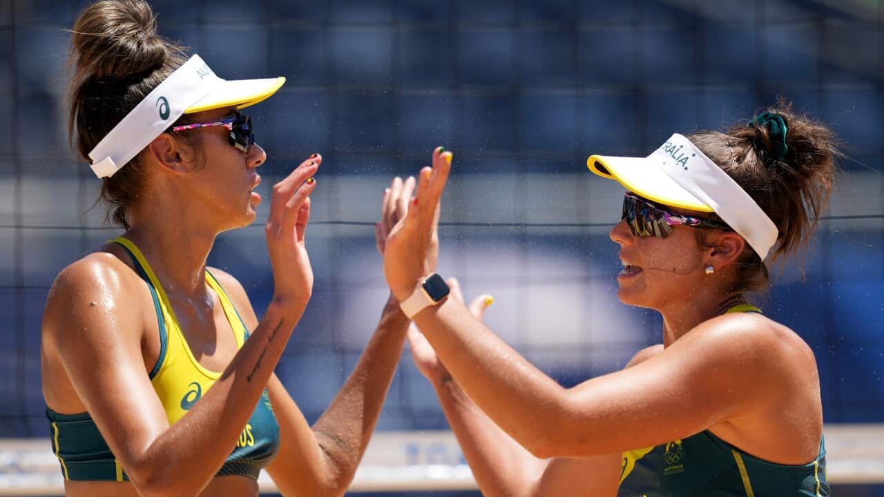 Taliqua Clancy and Mariafe Artacho del Solar of Australia celebrate a point during the Women's Final Beach Volleyball on Friday, August 6, 2021.