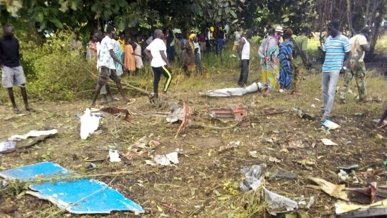 People at the crash site in Juba