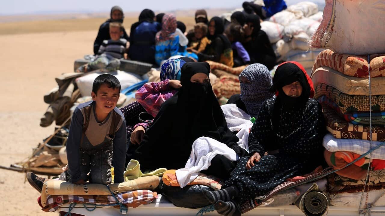 Syrians, who fled the IS stronghold of Raqqa, near the village of Balaban, south of Jarablus.