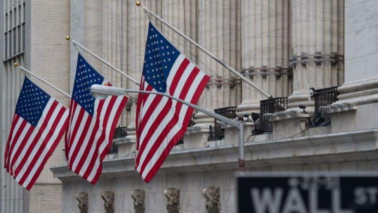 A street sign is seen near the New York Stock Exchange in New York.