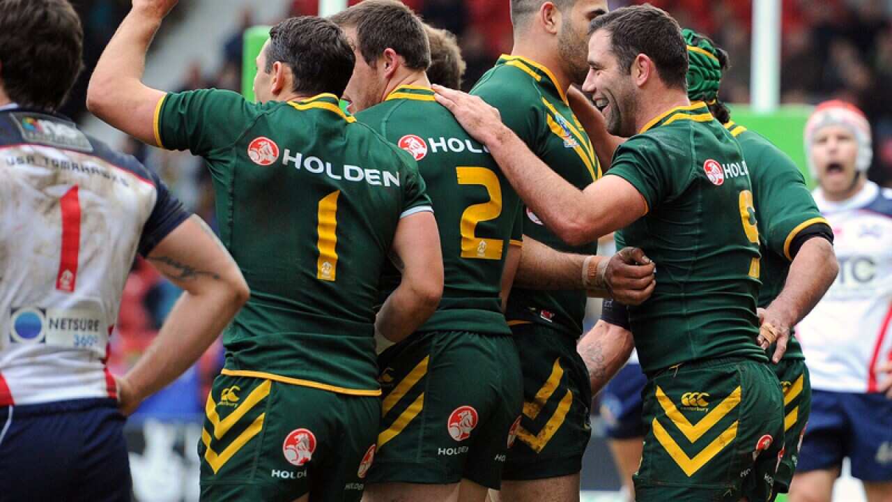 The Kangaroos celebrate a try against the USA
