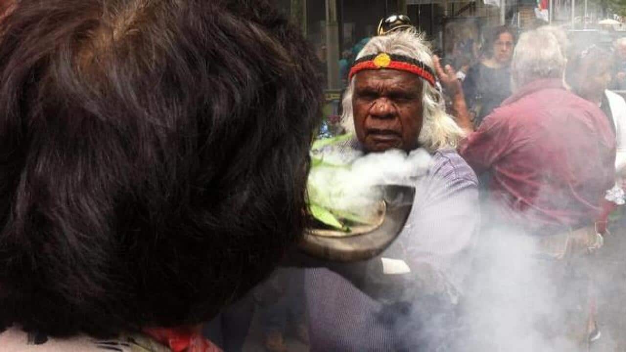 A group of Koori Elders arrived at Martin Place to conduct a smoking ceremony following the Sydney siege. 