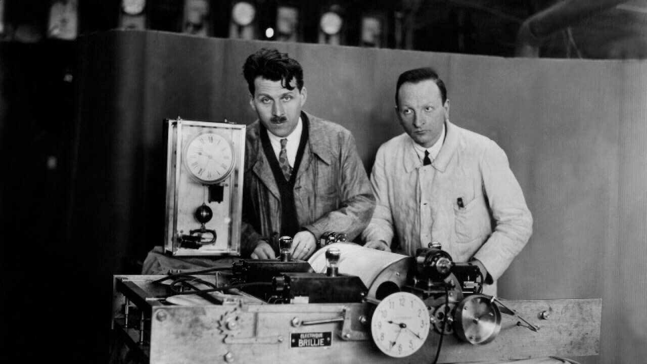 The French Academy Of Sciences displays the Talking Clock In Paris in 1932 (Getty)