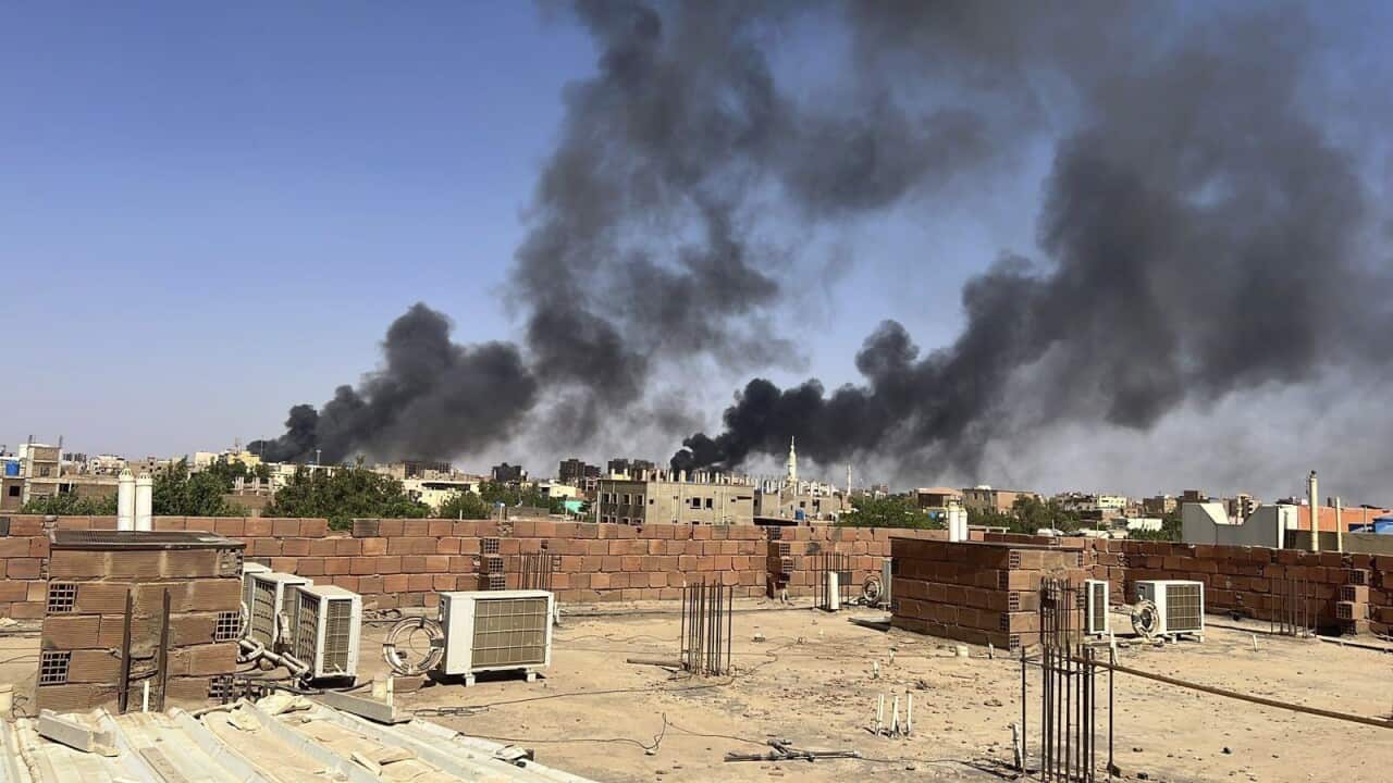 Smoke fills the sky in Khartoum, Sudan, near Doha International Hospital.