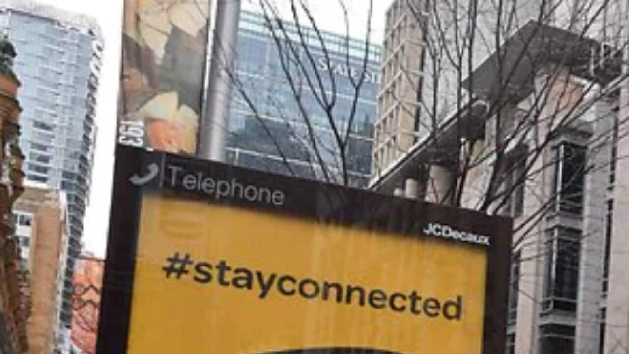 A RUOK sign on George Street is seen in the central business district in Sydney