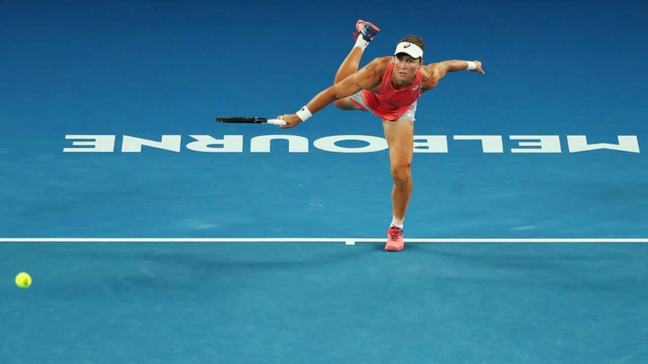 Samantha Stosur of Australia (with Shuai Zhan of China) in the women's semi final