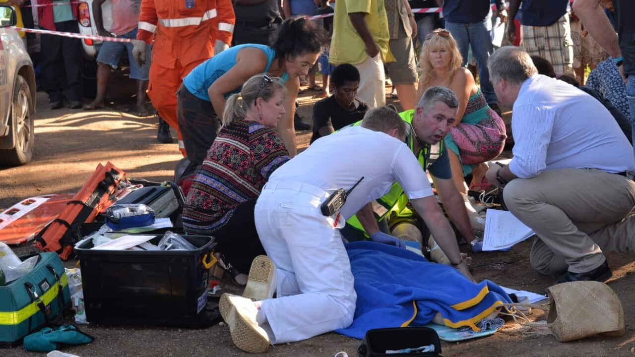 Supplied image obtained Tuesday, June 21, 2016 of the scene of a tour bus crash in Vanuatu's capital of Port Vila. 