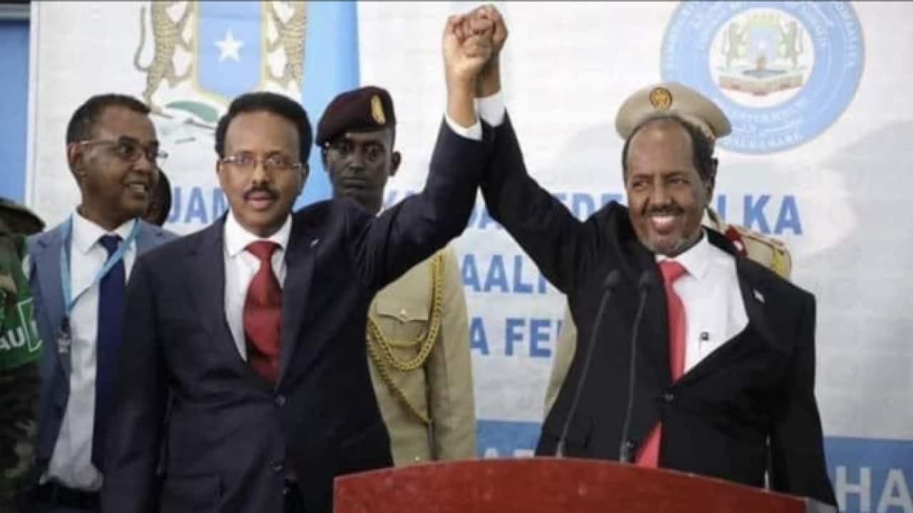 Hasan Sheikh with Farmajo