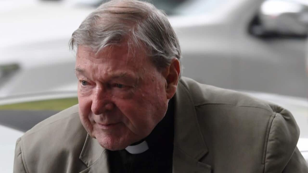 Cardinal George Pell arrives at the Melbourne Magistrates Court in Melbourne, Australia, Thursday, March 29, 2018. (AAP Image/Joe Castro) NO ARCHIVING