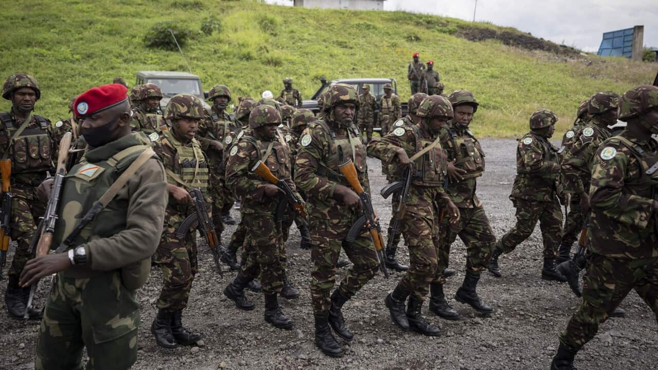 Members of the Kenya Defence Forces (KDF) deployed as part of the East African Community Regional Force (EACRF) arrive at the airport in Goma