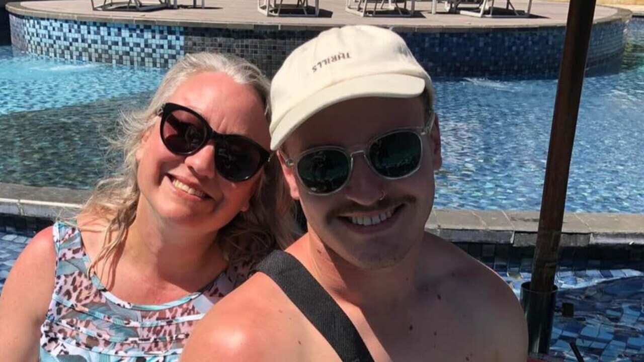 Stacey Chater and her son Brayden together by a pool.