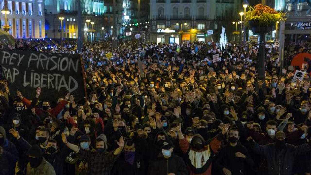 Protesters campaign against the jailing of Pablo Hasel before riots started
