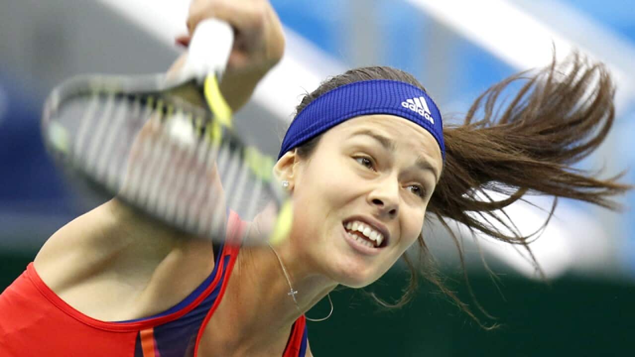Serbia's Ana Ivanovic serves a ball