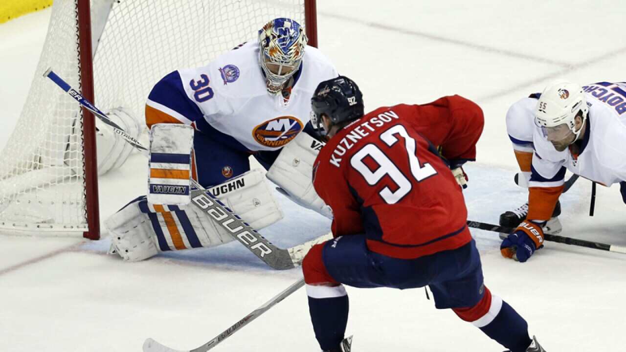 Washington Capitals center Evgeny Kuznetsov (92), prepares to shoot