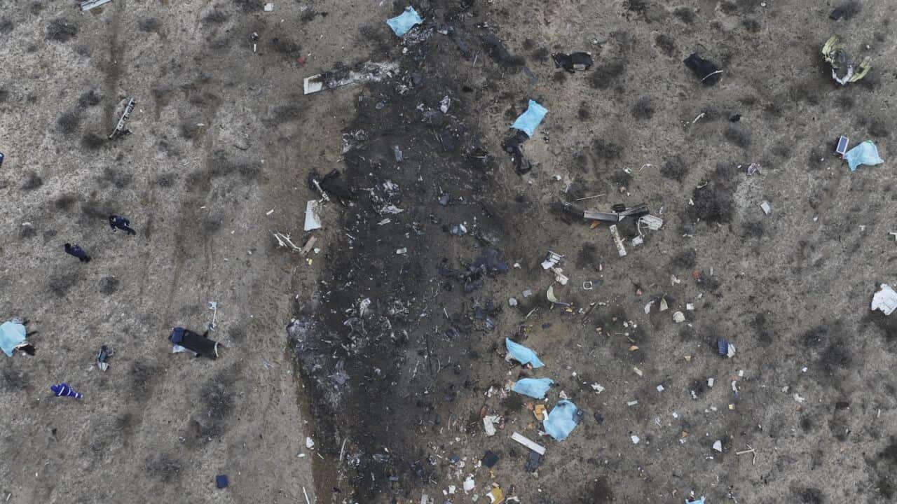 Debris at the crash site of a passenger plane.