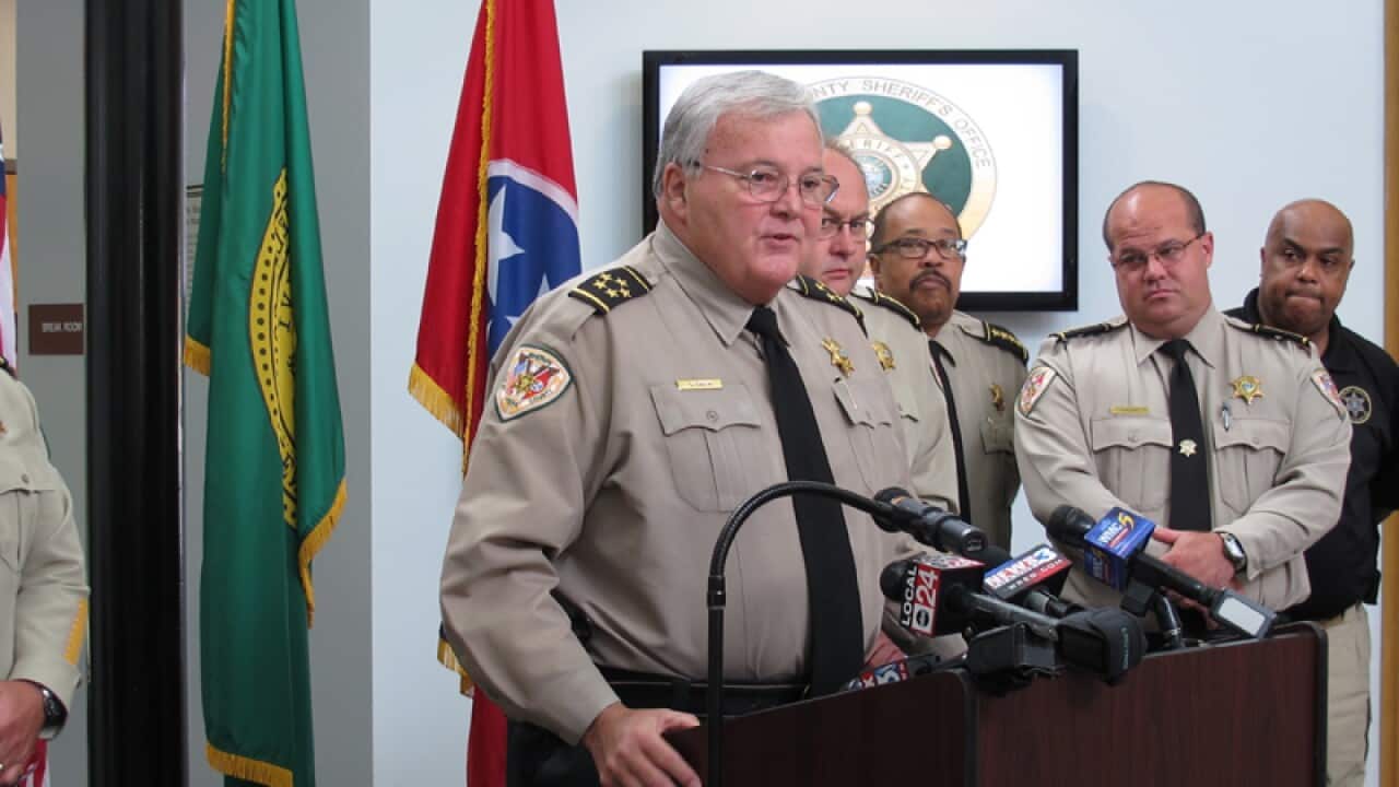 Sheriff speaks at a news conference about the fatal stabbings