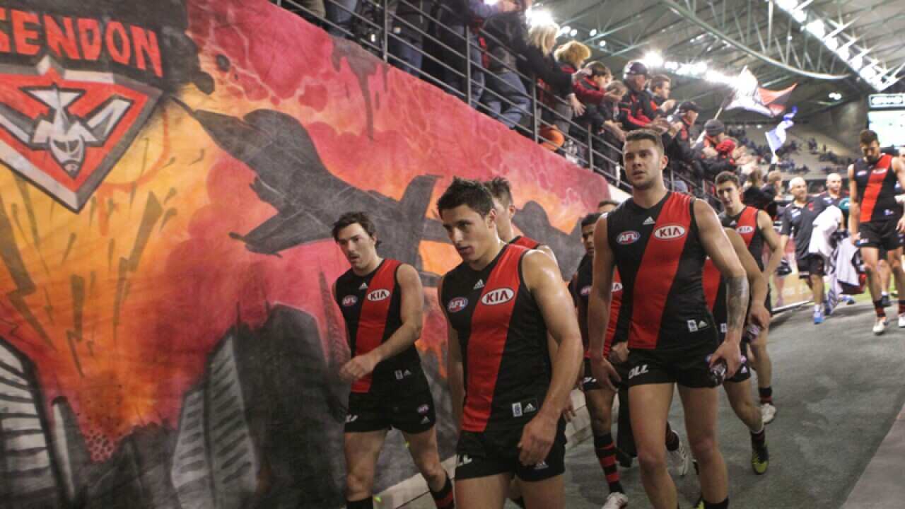 Essendon leave the field