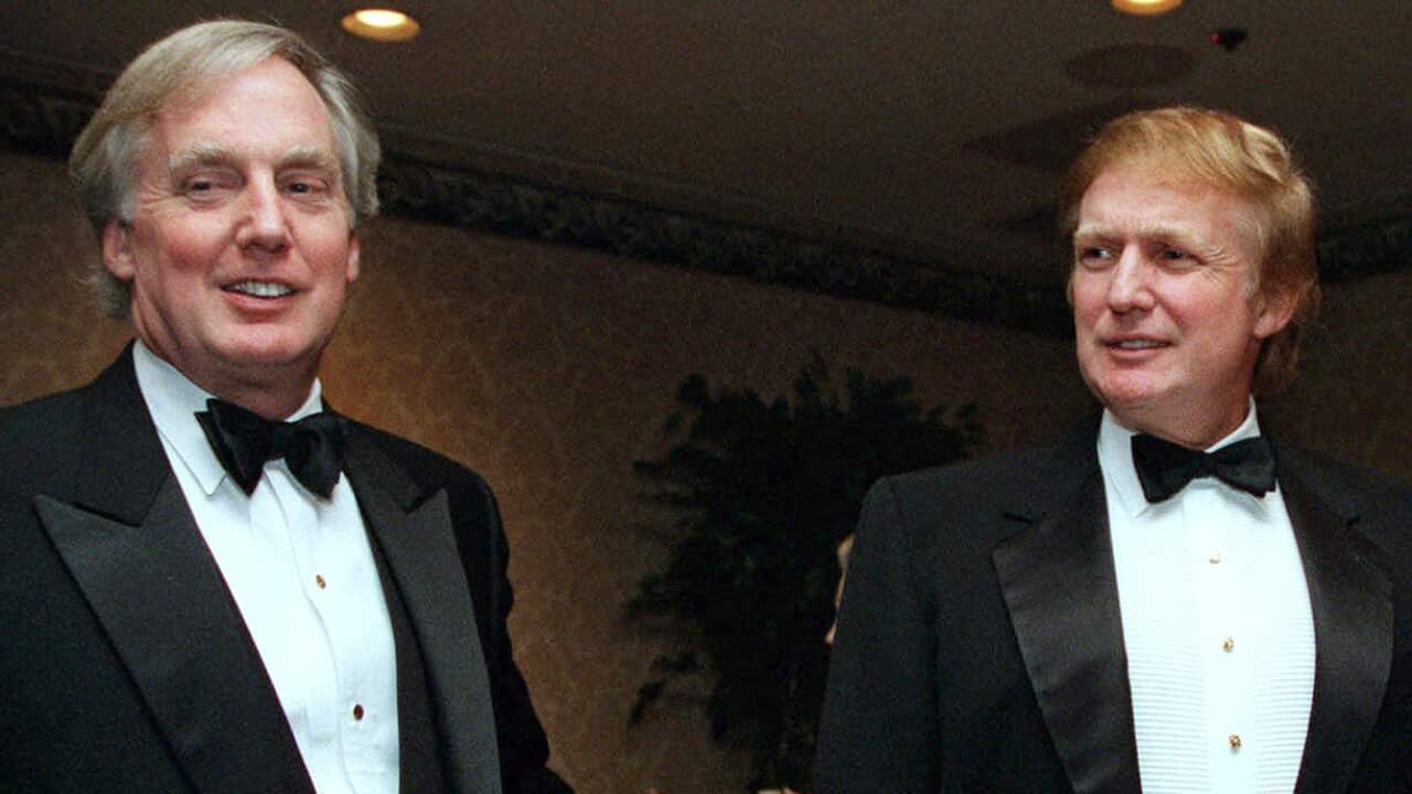 In this 1999 file photo, Robert Trump joins his brother Donald Trump at an event in New York. 
