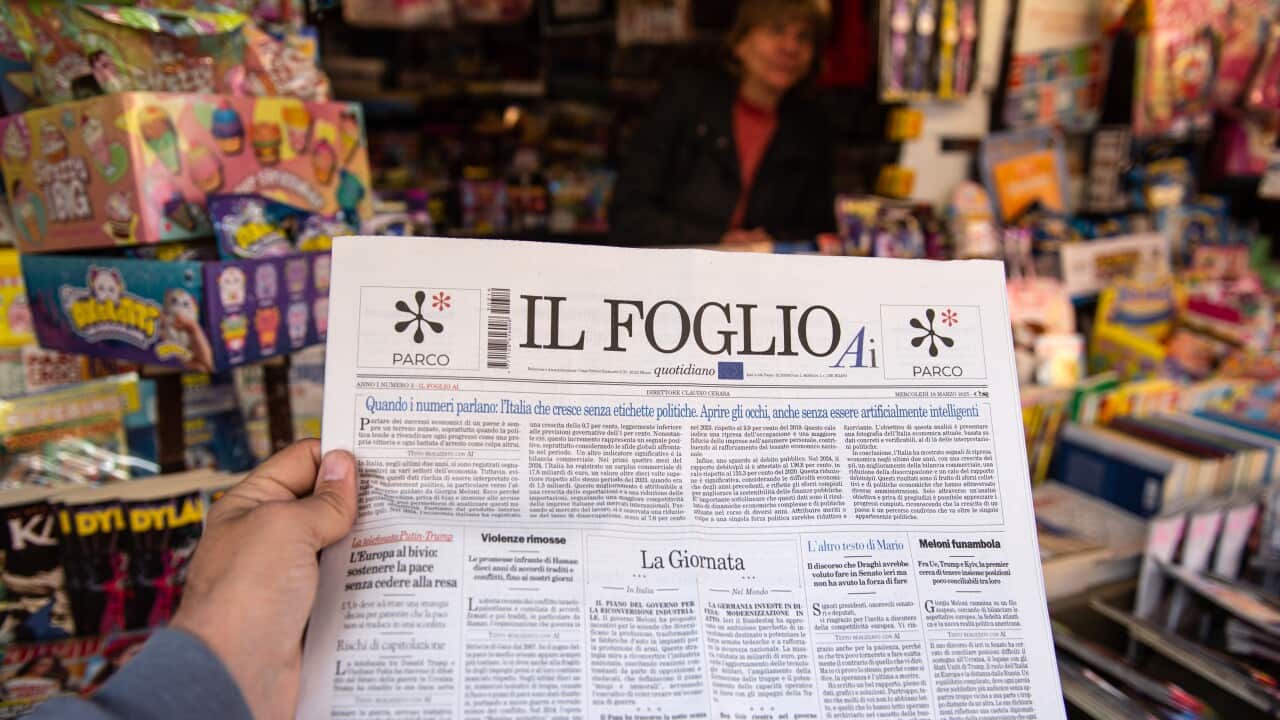 A person holds a copy of the Italian daily newspaper “Il Foglio AI“ made with artificial intelligence on newsstands at on March 19, 2025 in Salerno, Italy.