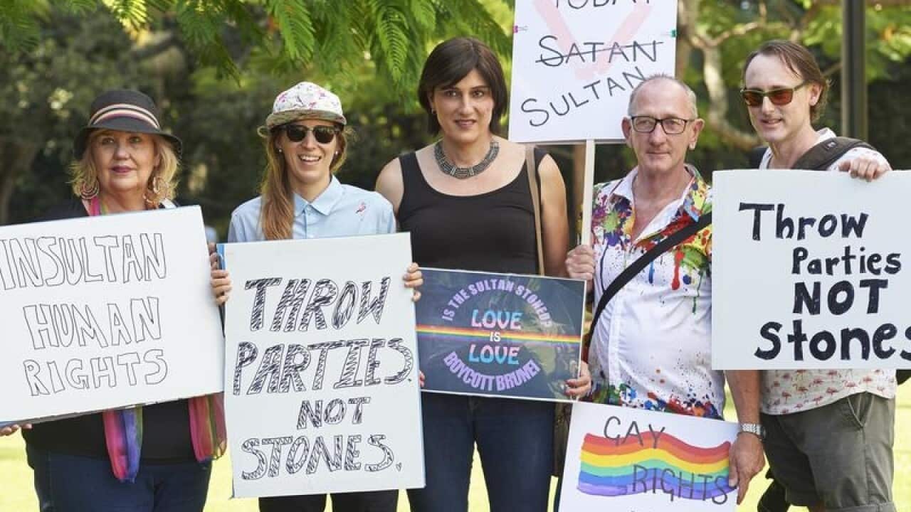 A group of protesters rallying in Brisbane