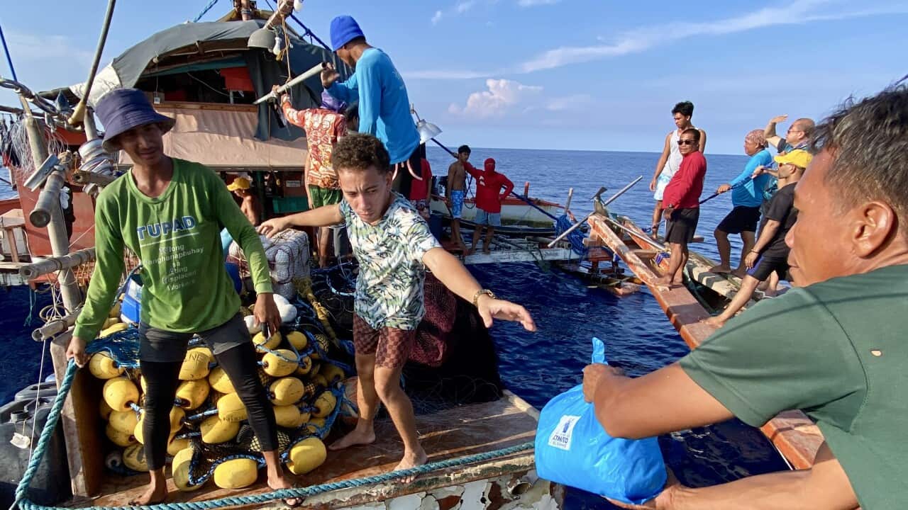 Filipino fishermen join a civilian-led supply mission to the disputed South China sea