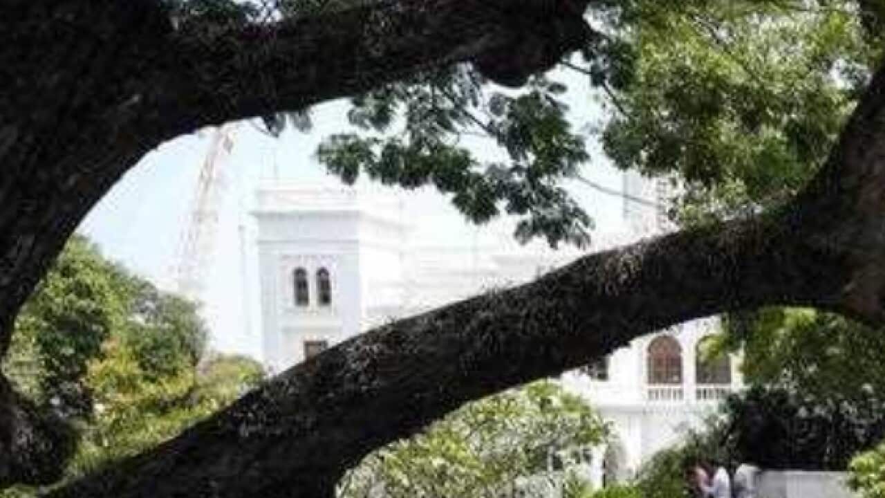 Police use tear gas as protesters storm the compound of prime minister Ranil Wickremesinghe 's office