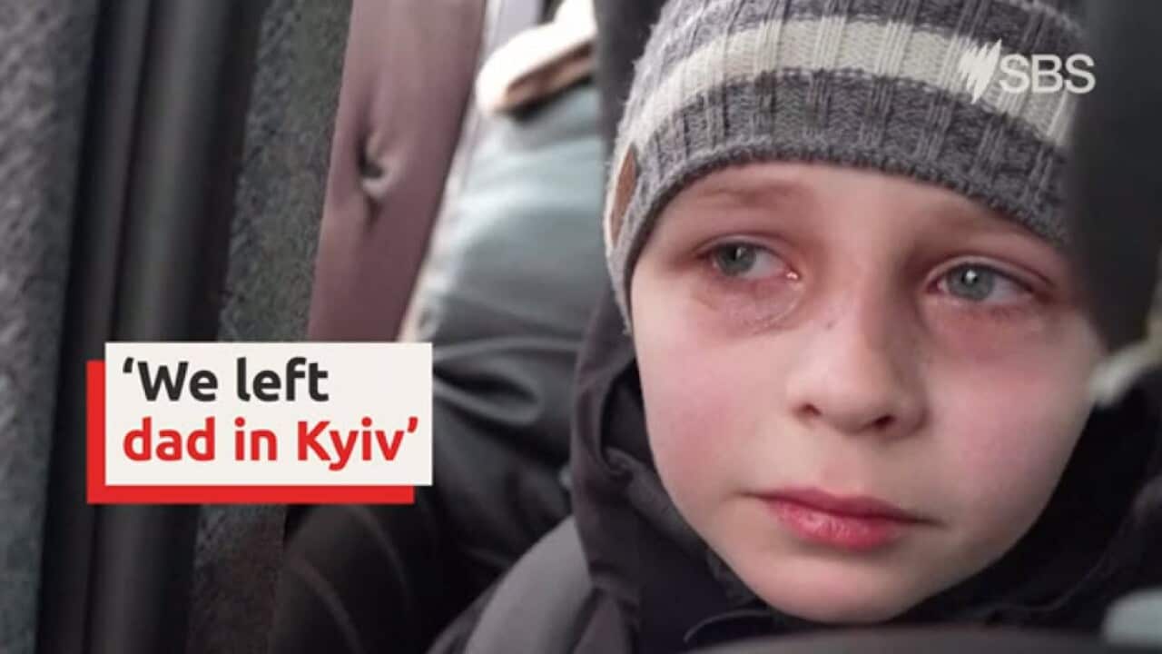 Ukrainian boy describes fleeing his home as his father stays behind