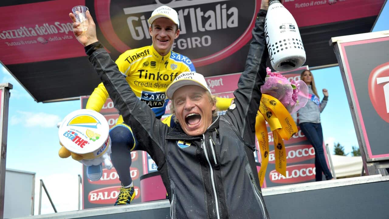 Australian rider Michael Rogers celebrates with team owner Oleg Tinkov after winning the 20th stage of the Giro d'Italia 2014. (EPA)