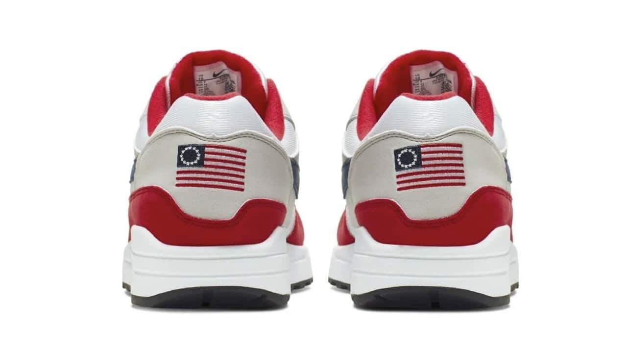 Nike Air Max 1 Quick Strike Fourth of July shoes that have a US flag with 13 white stars in a circle on it, known as the Betsy Ross flag.