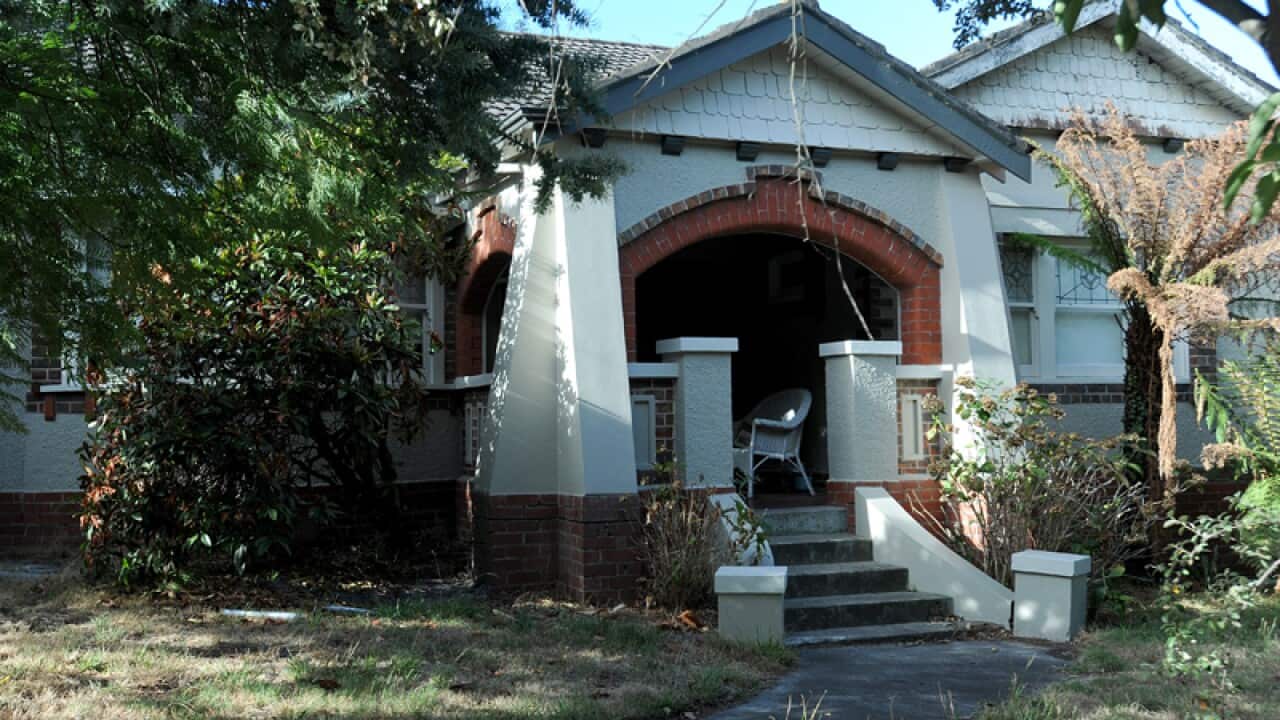 The house of an elderly Melbourne couple who were killed in their home