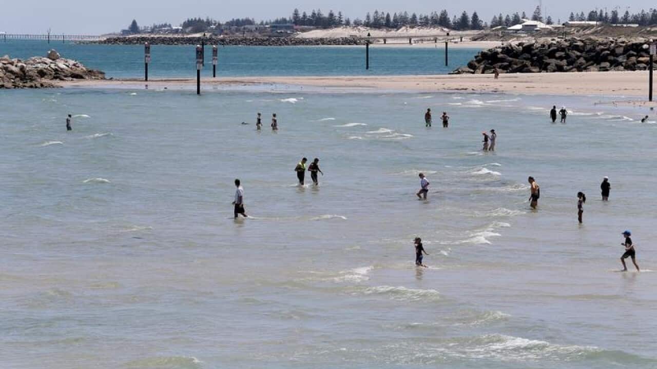 Glenelg beach during hot weather in Adelaide.