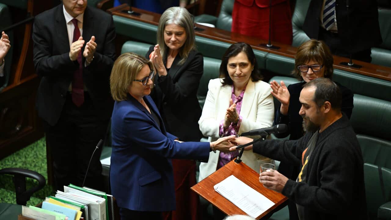 Victorian Premier Jacinta Allan (left) shakes hands with Assembly Co-Chair Rueben Berg (right) after delivering a speech from the floor of Victorian Legislative Assembly at the Parliament of Victoria in Melbourne, Tuesday, October 14, 2025.