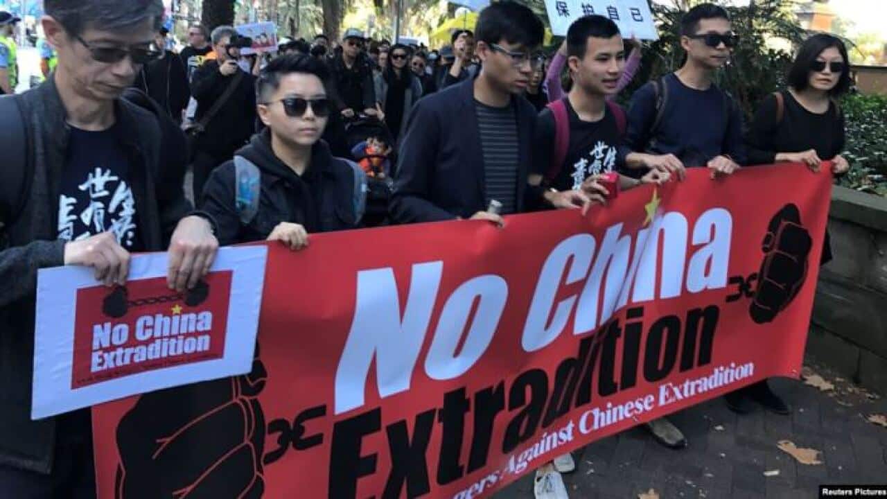 Quốc hội Trung Quốc vừa thông qua một hiệp ước dẫn độ với Việt Nam trong khi dự luật dẫn độ của nước này với Hong Kong đang bị nhiều người trên thế giới phản đối, gồm cả những người biểu tình trong ảnh tại Sydney, Úc.