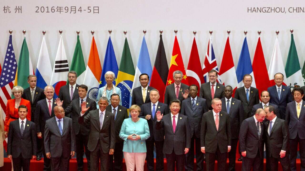 State leaders take part in a group photo session for the G20 Summit