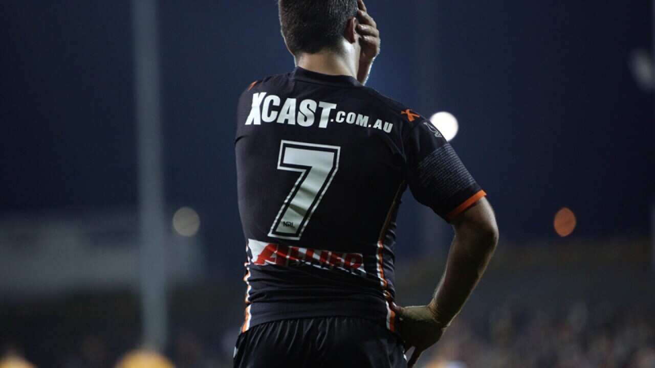 Luke Brooks stands during a match.