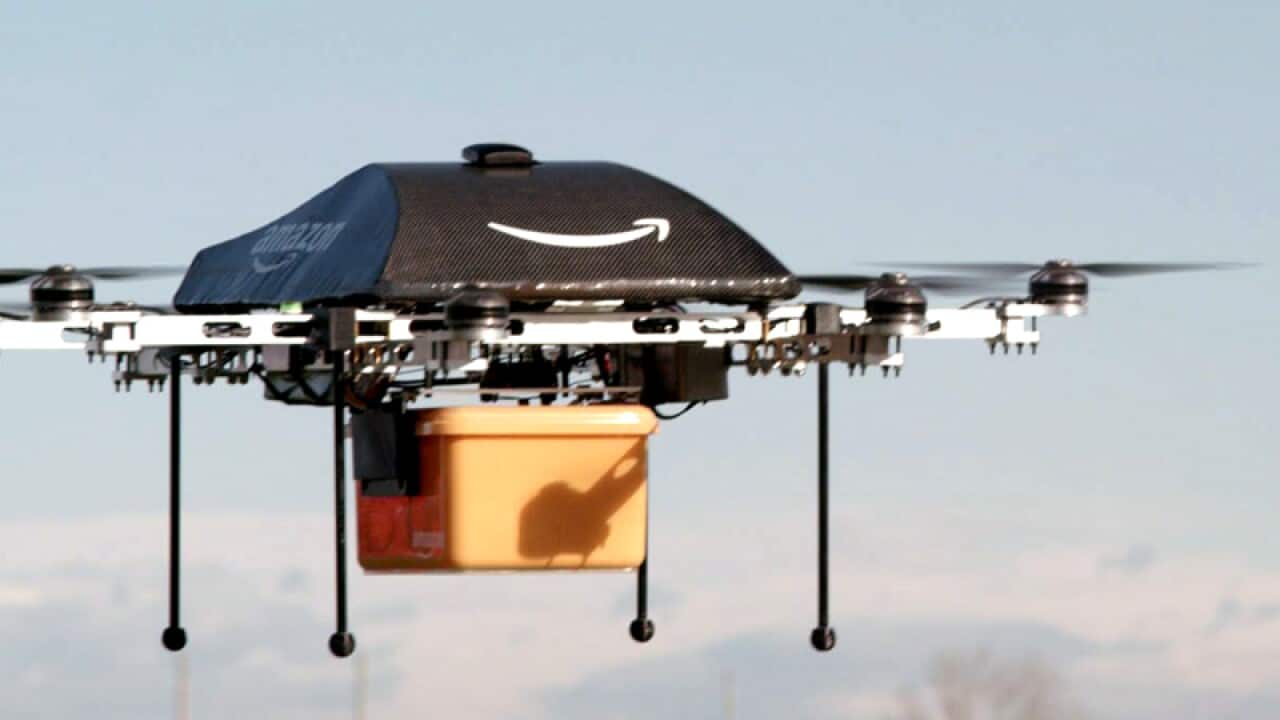 An octocopter drone with an Amazon logo