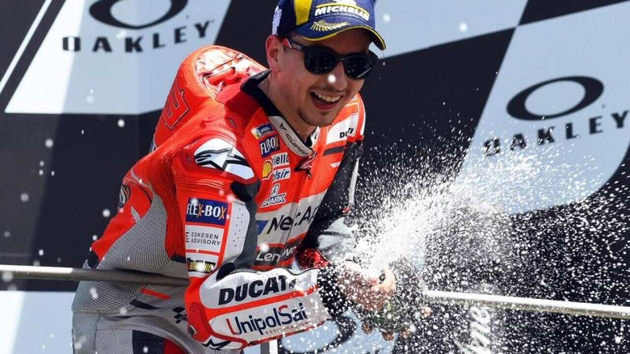Jorge Lorenzo of the Ducati Team celebrates.