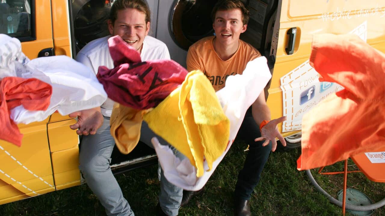 Mobile laundry founders Nic Marchesi and Lucas Patchett  Read in front of a van with clean clothings