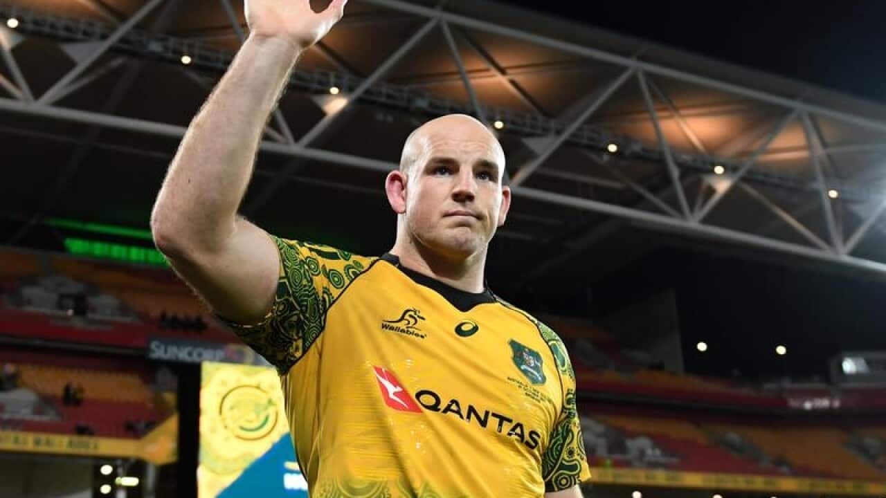 Stephen Moore waves to the crowd after a game