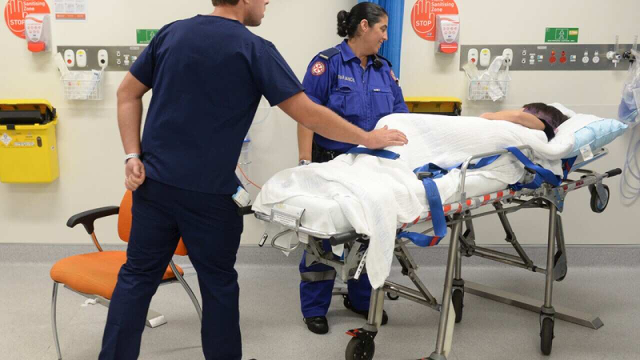Ambulance and medical staff at St Vincent's Hospital