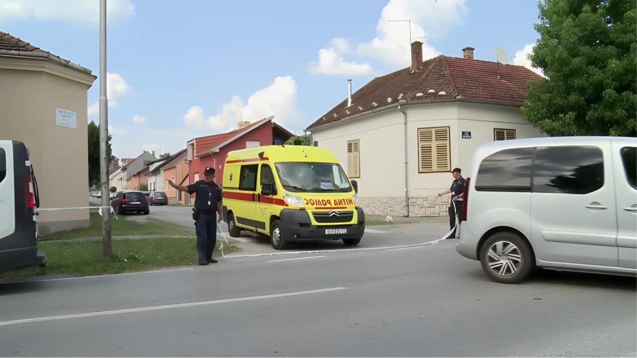 Police set up a cordon at the shooting scene (AP)