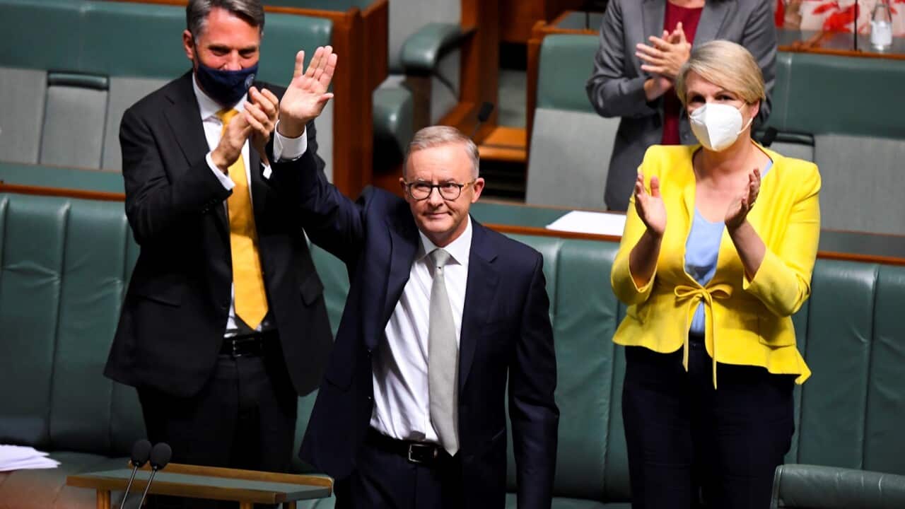 Federal Opposition Leader Anthony Albanese acknowledges the public galleries after delivering his Budget Reply Speech in the House of Representatives of Parliament House in Canberra, Thursday, March 31, 2022. (AAP Image/Lukas Coch) NO ARCHIVING